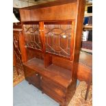 A 1960's/70's dark Mahogany Sideboard having an upper double doored section with 21 pane doors,