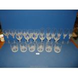 A quantity of drinking glasses with frosted glass decoration including; six champagne flutes,