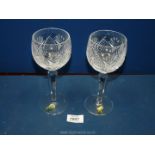 Two Waterford crystal wine glasses with original stickers on.