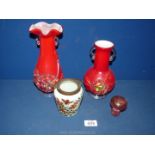 Two Chinese reproduction red glass vases, Isle of Wight paperweight, opaque dish etc.