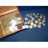 A quantity of English coins to include; approximately 59 six pence pieces, 19 half crowns,