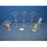 Three slim antique champagne glasses, cut glass scent bottle,