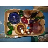 A quantity of coloured glass to include hand painted bottles, sugar shaker, blue bowls,