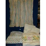A quantity of curtain fabric: borderline, floral, etc.