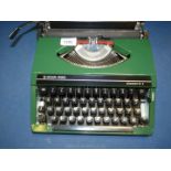 A Silver Reed typewriter in case, made in Japan.