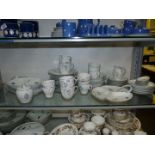 A china Teaset by Noritake, white with silver rim leaf pattern including six large plates,