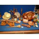 A large quantity of treen including fruit basket with fruit bowls, totem bookend, coasters,