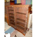 A fine old dark Oak double floor-standing bookshelves,