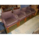 A set of four John Lewis puce pattern upholstered reception style armchairs,