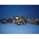 Three pairs of binoculars including; Jessops 8 x 42, Hilkinson 8 x 30 and USSR 6 x 24 cased.