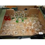 A quantity of mixed glass to include; 5 green stemmed hock glasses, 4 pink stemmed wine glasses,