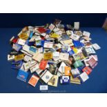 A large bag containing over 220 vintage collectable worldwide matchbooks, unused.