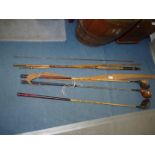 Two golfing woods with bamboo handles plus a metal shaft woods and a bamboo fly fishing rod