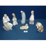 A quantity of Lladro Nativity scene figures to include; Mary, Shepherd (without crook), cow, King,