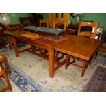 A very substantial contemporary Oak Refectory design Dining Table standing on square legs united by