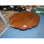 An antique pie crust edged Lazy Susan, 22" diameter (some pieces detached).