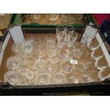 A large quantity of cut and engraved glasses including; tumblers, wine, brandy balloons, etc.