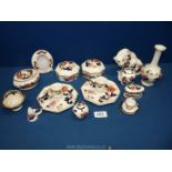 A small quantity of Mason's china to include; lidded dishes, chamber-sticks, tiger,