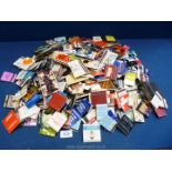 A large bag of over 350 vintage collectible worldwide match books, used.