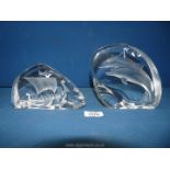 Two Mats Jonasson etched lead crystal sculptures; one of Dolphins swimming,