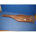 An old leather leg of mutton shotgun Case with brass lock and latch.
