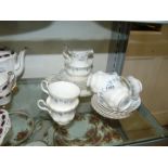 A Royal Albert Memory Lane Teaset including five cups and saucers, six side plates, milk jug,