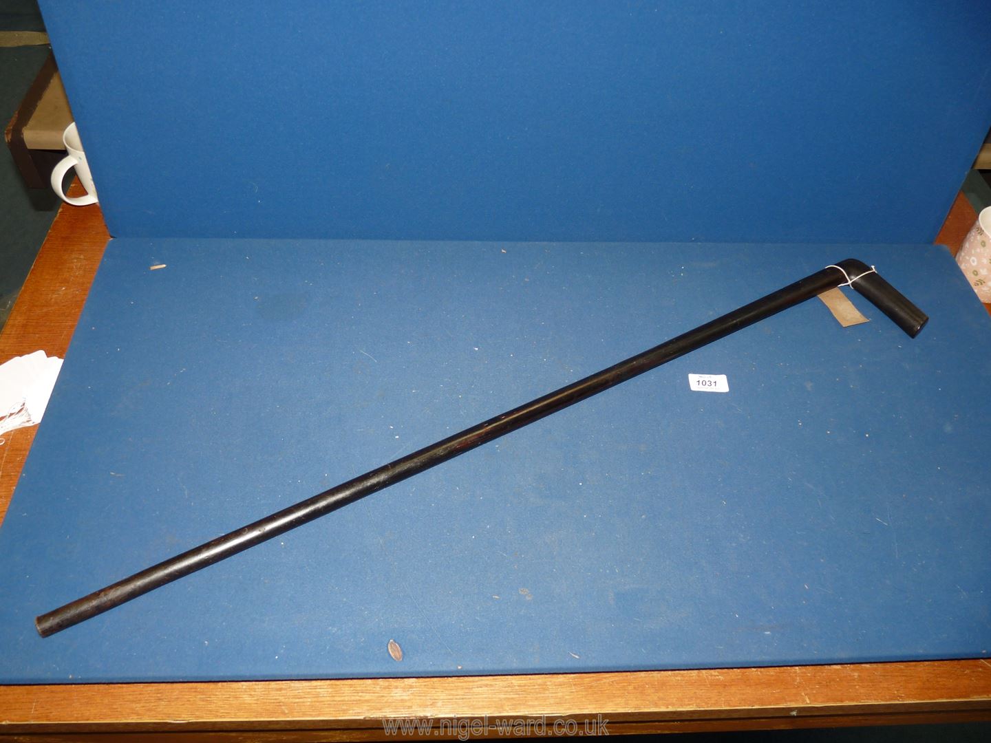 A one piece walking Stick, possibly made from ebony.