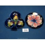 A Moorcroft clover shaped dish having Lily pattern with very small chip and a small blue Anemone