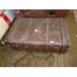 An old Stardex travel trunk, canvas with leather corners and handles, separate shelf inside,