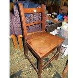 A Georgian Oak solid seated side chair of peg-joyned construction.