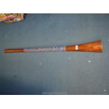 A teak hand painted Aboriginal Didgeridoo.