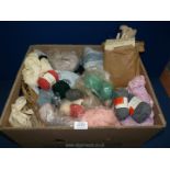 A box of knitting wool, Stitch-craft patterns, etc.