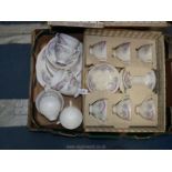 A boxed Gainsborough eighteen piece Teaset in white with blue and pink floral pattern,