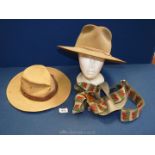 A brown suede Stetson and M&S canvas hat together with a pair of Welsh braces.