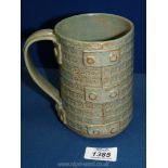 An unusual studio pottery tankard.