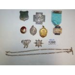 Two Ballroom medals, Long Service Operatic Society medal, a silver Blood Donor badge,