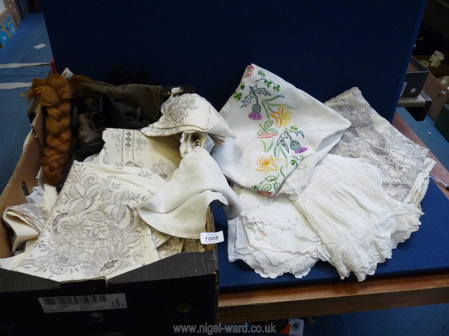 A large quantity of linen and lace (some embroidered) to include; tablecloths, napkins, etc.