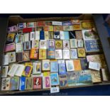 A large tray of over 170 vintage collectible worldwide matchboxes.