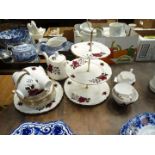 A Colclough part Teaset including three tier cake stand, five cups, six saucers,