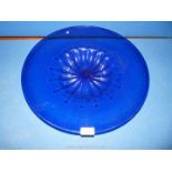 A large hand blown Bristol blue charger. 18" diameter.