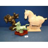 A large ceramic terracotta coloured horse plus a metal figure of a running horse with green glaze