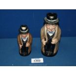 Two Royal Doulton 'Winston Churchill' Toby jugs, 5 1/2" and 4"tall.