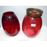 Two cranberry glass Shades for a church oil lamp, one with brass crown,