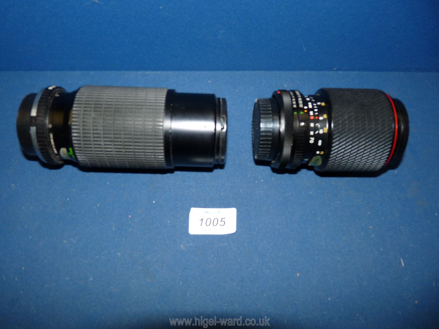 A Tokina Sd 70-210mm f/4 5.6 zoom lens to fit a Canon fd together with a Marexar cx 80-200mm f/4.