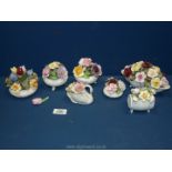 A quantity of posies including; Royal Doulton, Aynsley January Snowdrop (in barrel), Radnor,