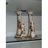 A large pair of candlesticks (12" tall) plus a small pair (6 3/4" tall) in Mason's Mandalay pattern.