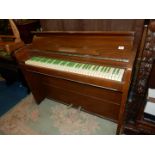 An unusual and compact "Bijouette" upright ship's type Piano,