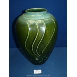 A large green glazed vase, speckled effect to top, 12" tall.