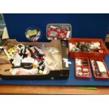 A quantity of sewing equipment to include; buttons, elastic, reels of thread, pins, scissors, etc.