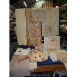 A large quantity of linen to include; embroidered napkins, damask, lace, etc.
